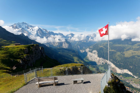 Swiss,Flag,Waving,On,A,Viewpoint,At,The,Edge,Of